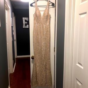 Nude formal fitted gown.